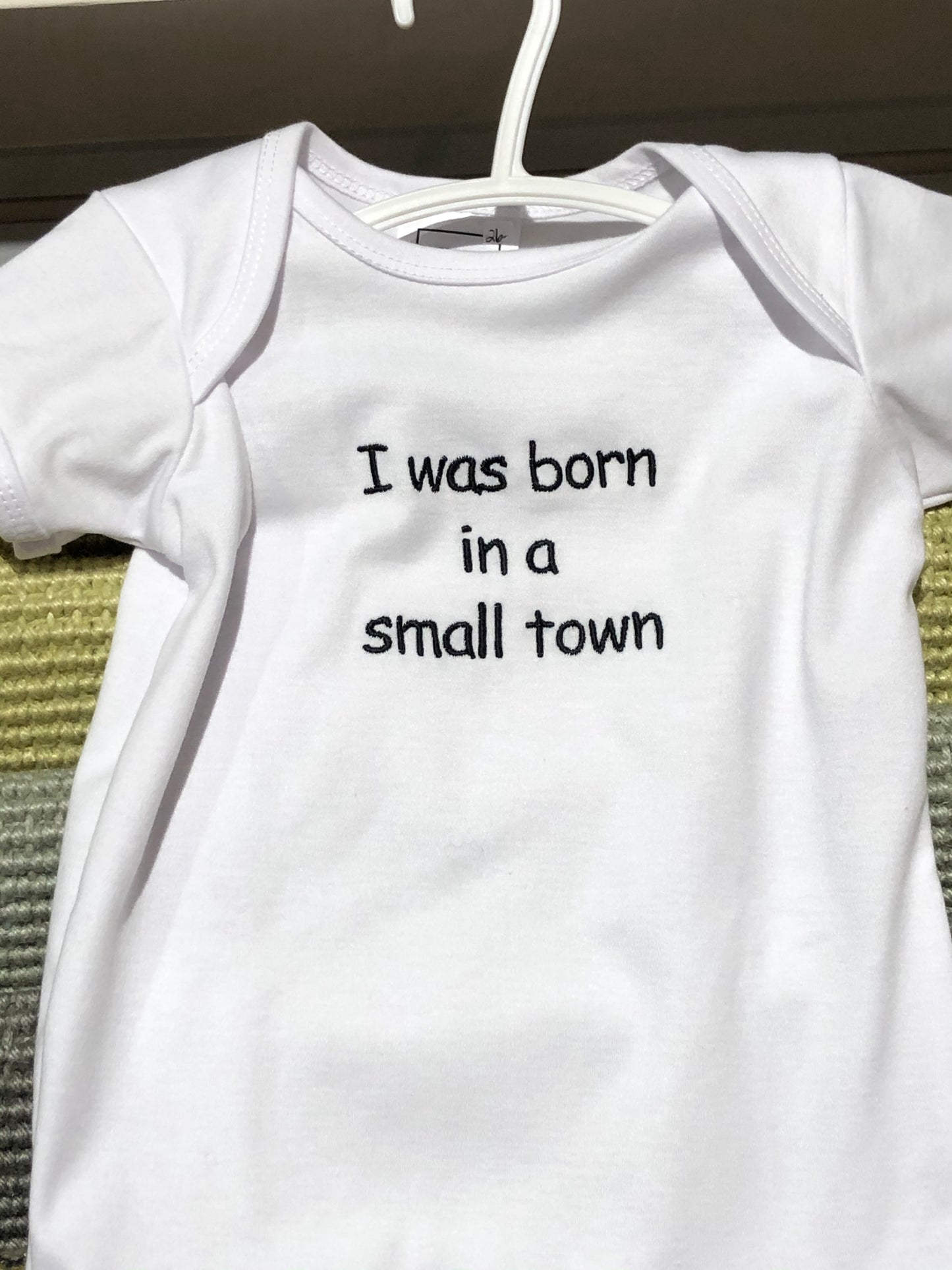 I was Born in a Small Town Onesie