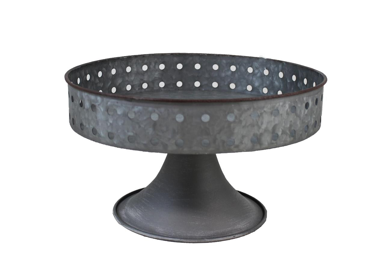 Grey metal tray on pedestal